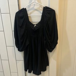 Size small black Free People romper.